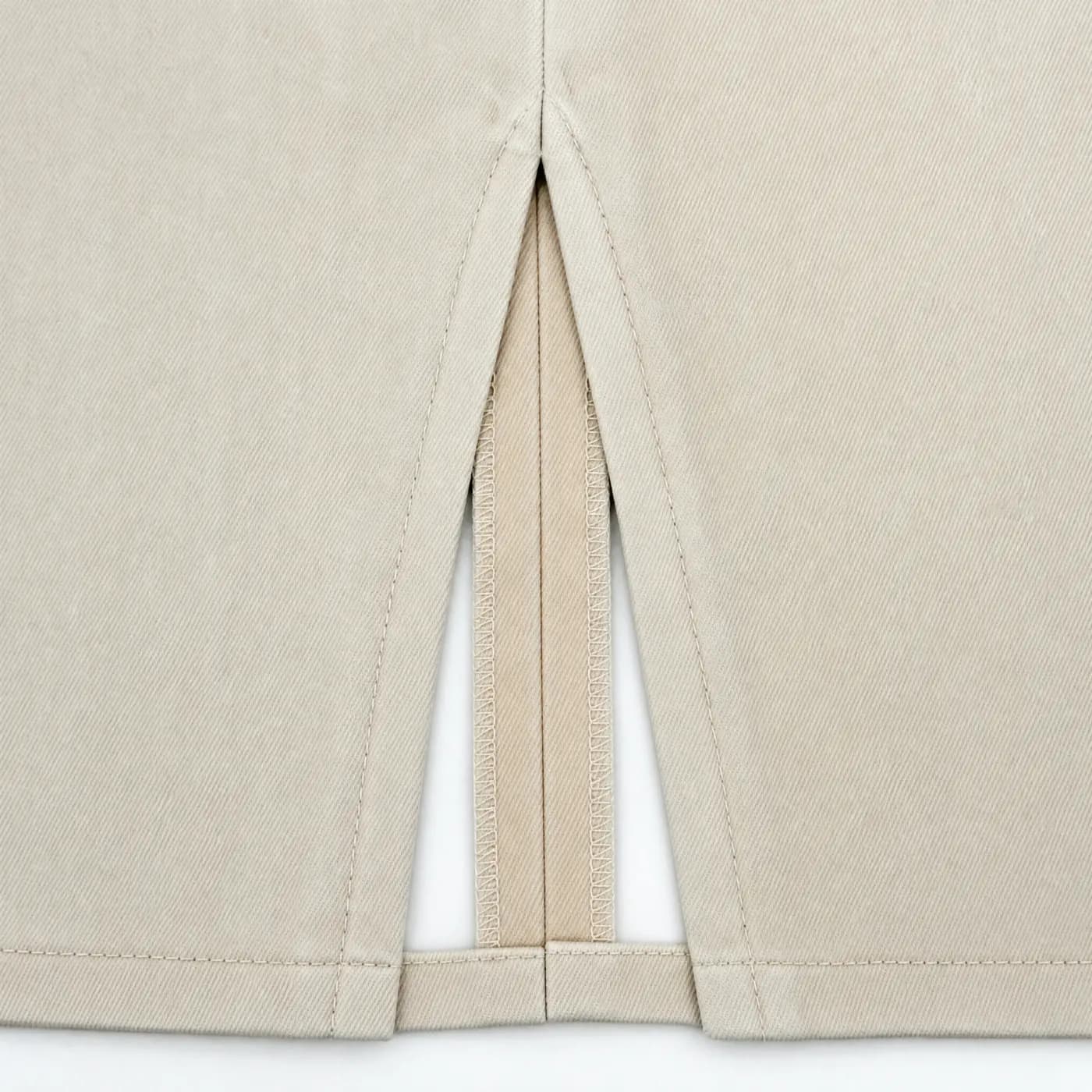 A seam allowance pressed open flat with stitching on both sides.